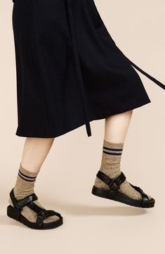 Shimmer from day to night in these soft ribbed socks with twinkling metallic yarns set against sporty contrast stripes. Metallic fibers/nylon Hand wash, dry flat Made in Japan Socks Street Style, Ribbed Socks, Twinkle Toes, Metallic Yarn, Basel, Night In, Crew Socks, Made In Japan, Hand Wash