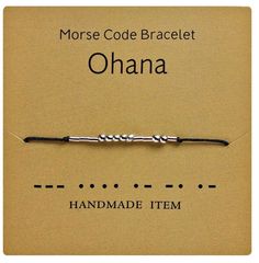 Ohana Morse Code Adjustable Bracelet with Charm Beads This is an awesome homemade bracelet to let someone special know you see them and you have a special message that they need to hear!   Morse Code jewelry is a great gift for a co-worker, a friend, teacher, sister, mother, neighbor.  Wonderful as a stocking stuffer or slipped into a little note for some extra encouragement!  They are made of waxed nylon cord and stainless steel beads.  The Morse Code alphabet is printed on the back side of the display card. Morse Code Letters, Brother Sister Gifts, Gold Bad, Code Morse, Distance Bracelets, Couple Bracelet, Morse Code Bracelet, Cord Jewelry, Letter Bracelet