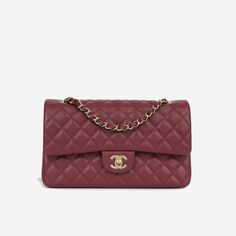 For timeless Parisian-chic there is no better investment than a Chanel classic flap bag. Created in black caviar leather in the coveted Medium size remains the all-time best-seller at bagsalora. This Chanel comes with all the iconic features including multiple compartments and pockets. The interwoven chain sits elegantly on your shoulder or doubled up on your arm. SPL Exterior Burgundy caviar leather Champagne gold-tone hardware Double flap CC Twist lock closure Slip pocket at rear of bag Plaque series Brand new Interior Burgundy lambskin leather Zip compartment on first flap Two slip pockets at interior wall Brand new Sold with box and dust bag SPL Height 16cm Width 26cm Depth 7cm Chanel Classic Flap Bag, Louis Vuitton Capucines, Classic Flap Bag, Black Caviar, Vintage Louis Vuitton, Timeless Handbag, Classic Flap, Exclusive Bag, Medium Bags