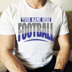 a man sitting on top of a couch wearing a white t - shirt that says football