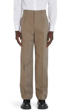 A high waist emphasizes the streamlined profile of dress pants tailored from softly brushed wool twill with crisp knife pleats smartly detailing the front. 27 1/2" inseam; 19" leg opening; 12" front rise; 16" back rise (size Medium) Zip fly Front slant pockets; back welt and button-welt pockets 100% wool Dry clean Made in Italy Designer Clothing Pants Tailored, Twill Dress, Knife Pleats, Welt Pockets, Bottoms Pants, Bottega Veneta, Dress Pants, Designer Clothing, High Waist