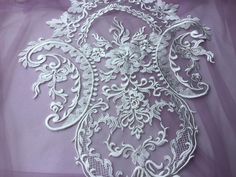 Luxury Embroidery Ivory Bridal Lace Applique/Wedding Dress Lace Back Applique Listing is for 1 piece Stock Color Ivory as picture shown Measurements About 40cm*34cm White Lace With Intricate Embroidery For Ceremonies, White Intricate Embroidered Lace For Ceremony, White Intricate Embroidery Lace For Ceremony, White Embroidered Lace For Ceremony, Elegant White Embroidered Fabric For Wedding, Embroidered Cream Wedding Gown, Cream Wedding Dress With Intricate Embroidery, White Embroidered Lace Fabric For Wedding, White Wedding Gown With Pearl Embroidery