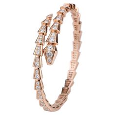 18k Rose gold viper snake bracelet with 3.10 carat in F/Vvs1 diamonds. new , store sample retail 38000€. This bangle is resizable. Luxury Diamond Snake Jewelry, Luxury Diamond Snake Ring, Luxury Snake Ring With Diamond Accents, Luxury Flexible Diamond Bangle, Bvlgari Serpenti Bracelet, Bvlgari Bracelet, Viper Snake, Paris Bracelet, Pave Bangle