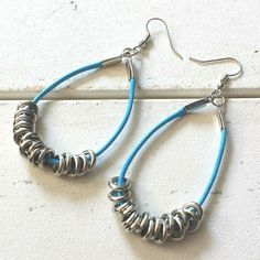 Handmade Turquoise Blue Long Polyester Cord Silver Rings Dangle Hoop Earrings Handmade Dangle Earrings Measure Approximately 80mm (3.25") Long Features Silver Plated Brass Findings And Earring Hooks Each Earring Has A Group Of 8mm Wide Silver Ccb Rings Suspended From A Supple Waxed Polyester Cord Lightweight, Fun, And Fashionable Earrings Blue Metal Dangle Hoop Earrings, Nickel-free Blue Metal Hoop Earrings, Blue Nickel-free Hoop Earrings For Everyday, Blue Small Hoop Earrings Wire Wrapped, Blue Small Hoop Earrings With Wire Wrapping, Blue Bohemian Hoop Earrings For Everyday, Everyday Blue Teardrop Hoop Earrings, Adjustable Blue Teardrop Hoop Earrings, Blue Metal Earrings For Everyday Wear