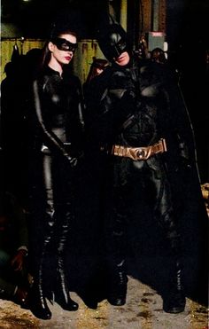 two people dressed up as batman and catwoman