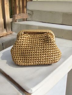 HANDMADE ELEGANT HIGH QUALITY CLUTCH 🛍️You can use this gold metallic raffia bag at invitations, parties and special events for 4 seasons and it will turn all eyes on you.  ✔️Crochet Metallic Raffia Clutch Bag is knitted with metallic yarn. Luxury gold metallic leather rope is used.  ✔️A lining of the appropriate color is sewn into the handmade metallic hand bag ✔️The bag has satin lining.  ✔️The interior of the raffia bag is fully lined with satin and has a hidden metal lock.  ✔️Suitable for u Gold Clutch Bag For Events, Gold Pouch Evening Bag For Events, Gold Pouch Evening Bag For Special Events, Gold Handheld Shoulder Bag, Gold Clutch Coin Purse For Wedding, Gold Coin Purse Clutch For Wedding, Gold Handheld Shoulder Bag For Events, Handmade Gold Bags For Wedding, Gold Rectangular Coin Purse For Wedding