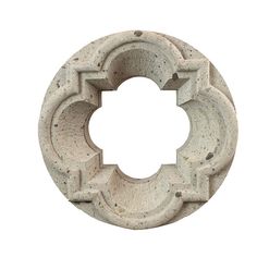 a circular object made out of concrete on a white background