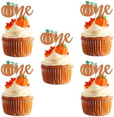 four cupcakes with one pumpkin on top and the number one in the middle