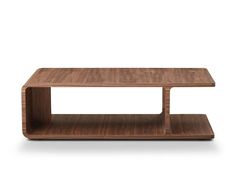 a wooden coffee table with two shelves on each side