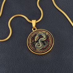 Embrace Renewal: Shedding Your Skin Charm Necklace Years: 1929, 1941, 1953, 1965, 1977, 1989, 2001, 2013, 2025 Traits: Enigmatic, intelligent, wise Channel the Snake's wisdom and adaptability as you navigate life's twists and turns. This necklace celebrates your ability to transform, renew, and emerge stronger from any challenge. Purchase This Best-Seller and We Guarantee It Will Exceed Your Highest Expectations! ➜ Our patent-pending jewelry is made of high quality surgical steel with an 18k gold finish option. This Necklace Item Is the Perfect Keepsake! Whether for Yourself or a Loved One. ➜ We Offer a 100% Happiness Guarantee ➜ If you’re not 100% satisfied with your purchase for any reason, please contact us and we will make it right. Your satisfaction is our ultimate goal. Product Dimen Spiritual Zodiac Sign Pendant Necklace, Mystical Medallion Necklaces With Engraving, Mystical Engraved Medallion Necklaces, Spiritual Engraved Jewelry With Snake Chain, Mystical Medallion Necklace Engraved, Mystical Medallion Engraved Necklace, Spiritual Snake Chain Necklace For Gift, Symbolic Zodiac Sign Pendant Necklace, Zodiac Sign Amulet Necklace With Round Pendant