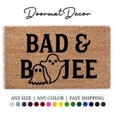 a door mat with the words bad and booe on it in black font, surrounded by colors