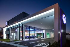 a car dealership lit up at night