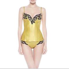 Figure Defining Silk Satin Bustier In Beautiful Golden Yellow Color Cups Embellished With Elegant Hand-Embroidered "Frastaglio" Lace In Black Underwired Construction Molded And Padded Cups (Padding Removable) Adjustable Bra Straps Side Boning For Shaping Concealed Back Zipper Closure Material: 70%Silk/10%Viscose/10%Nylon/5%Polyester/5%Elasthan Color: Yellow New With Tags Retail Value: $890 *Panty Not Included. Bustier Only Gold Lingerie, Satin Bustier, Silk Bra, Golden Yellow Color, Steel Boned Corsets, Adjustable Bra, Lace Camisole, Luxury Lingerie, Beautiful Lingerie