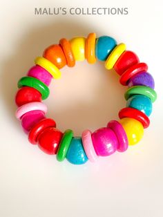 Kids Bracelets Wood Beaded Stretch Bracelets, Colorful Size: about 40mm inner diameter, 15mm wide, Rainbow Adjustable Stretch Bracelet, Adjustable Rainbow Stretch Bracelet, Rainbow Round Beaded Bracelets, Adjustable Multicolor Bangle, Adjustable Multicolor Bangle With Round Beads, Adjustable Multicolor Beaded Bangle, Adjustable Playful Bracelets, Pink Adjustable Bracelet For Playtime, Gift Bracelets With Colorful Beads