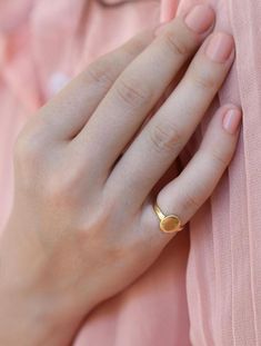 14k /18k/22k Solid Gold RingGreat ring for everyday wear! ❀Minimal, Simply beautiful and chic 14k / 18k SOLID GOLD oval signet ring.………………………………….........➤Features:♦ Solid 14K rose gold / 14k yellow gold/ 18K rose gold / 18k yellow gold♦ Oval size: 7.7 mm * 9.2mm♦ Band width: 2.2 mm➤ Please Pick your ring size➤ Please Pick your material: 14k /18k / 22k gold YELLOW/ ROSE ………………………………….........♥ Made to Order♥ 100% HAND MADE ♥ Each item is handcrafted individually………………………………….........➤ PACKAGINGI 14k Gold Signet Ring, Rose Gold Stackable Rings, Mid Finger Rings, Oval Signet Ring, Morganite Engagement Ring Rose Gold, Gold Nose Hoop, Gold Pinky Ring, Engagement Gifts For Her, Rose Gold Diamond Ring Engagement