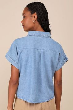 For an effortless, on-the-go look, we can't get enough of the Lulus Everyday Attitude Blue Chambray Short Sleeve Button-Up Top! Lightweight woven chambray shapes this cute top that has a collared neckline and short dolman sleeves with folded cuffs. Functional button placket accents the front, with a single patch pocket at one side. Fit: This garment fits true to size. Length: Size medium measures 21.5" from shoulder to hem. Bust: Great for any cup size. Waist: Not Fitted - comfortable room throu Blue Tencel Tops For Workwear, Blue Tencel Tops For Work, Light Indigo Tops With Button Closure For Workwear, Light Indigo Button Closure Top For Everyday, Chambray Shorts, Short Sleeve Button Up, Tops Fall, Dolman Sleeve, Cute Tops