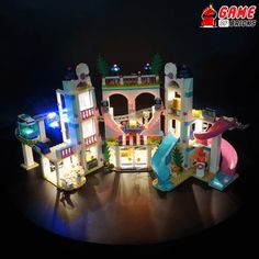 this is an image of a toy house made out of legos at night time