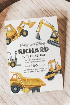 a birthday card with construction vehicles on it