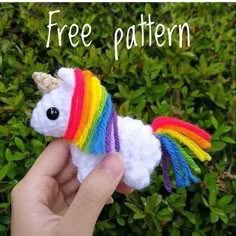 a hand holding a small stuffed unicorn toy in front of some green bushes with the words pattern tester call on it