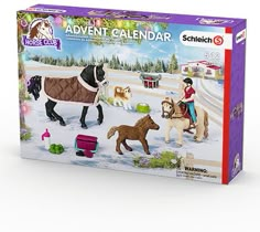 a puzzle box with horses and people in the snow