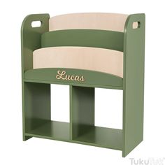 a green wooden bench with the name lucas on it's back and side panels