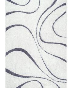 a white rug with black swirls on it