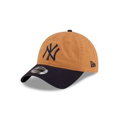 The New York Yankees Duck Canvas 9TWENTY Adjustable Cap features an embroidered Yankees logo at the front panels with a matching New Era Flag at the left-wear side. Additional details include a navy undervisor and an adjustable D-Ring closure at the rear. Navy Hat With Embroidered Logo And Curved Visor, Navy Dad Hat With Embroidered Logo, Casual Baseball Cap With Logo Detail, Casual Cap With Logo Detail, Navy Six-panel Hat With Embroidered Logo, Navy Embroidered Logo Six-panel Hat, Casual Hat With Logo And Curved Brim, Navy Six-panel Baseball Cap With Logo Patch, Casual Navy Baseball Cap With Logo Patch