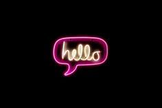 a neon sign with the word hello written in it's speech bubble on a black background