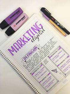 a notebook with writing on it next to some markers and pencils that read marketing digital