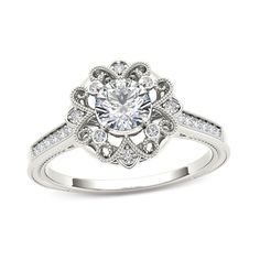 a white gold engagement ring with diamonds