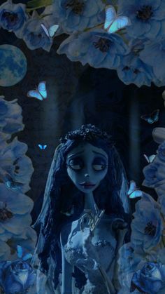 the corpse girl is surrounded by blue flowers