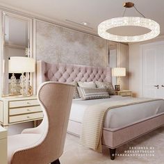 a bedroom with a bed, chair and chandelier