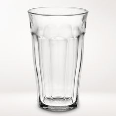 a clear glass filled with water on top of a table