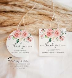 two tags that say thank you and have pink flowers on them