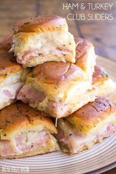 ham and turkey sliders stacked on top of each other