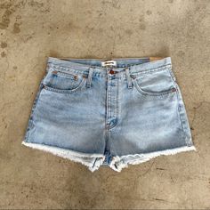 Slouchy And Relaxed, These Tomboy Jean Shorts Sit Lower On The Hips For A Laid-Back Feel. So Versatile In Pale Indigo Denim. Button Fly Closure Five-Pocket Style 100% Cotton Waistband Sits At Or Above Navel Approximate Measurements- Waist: 18” Rise: 11.75” Inseam: 2” ***No Trades Or Try Ons*** Light Wash Cotton Jean Shorts For Everyday, Everyday Light Wash Cotton Jean Shorts, Light Wash Cutoff Shorts For Everyday, Everyday Light Wash Cutoff Bottoms, High Waist Shorts With Frayed Hem, High Waist Shorts With Frayed Hem For Everyday, Everyday High Waist Shorts With Frayed Hem, Light Wash Short Jeans For Everyday, Everyday Light Wash High-waisted Shorts