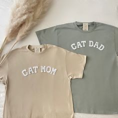 This matching cat mom and cat dad shirts are cute to wear for your pet's birthday or a cute gift for dog lovers! - They need to be purchased individually (it's not sold as a set) - All our shirts run a UNISEX fit. (Both for men and women). They are naturally oversized, so we normally recommend your true size. But if you like a more baggy look, we recommend sizing up. - These letters are iron-on patched and is heat pressed, not embroidered. - Please note that shirt brand used may vary depending o New Cat Owner, Fur Mom Shirt, Fur Mama Shirt, Gender Reveal Photos, Cat Dad Shirt, Cat Dad Gifts, Cat Mom Shirt, Cat Mama, Papa Shirts