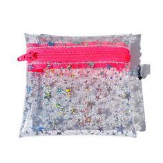 a pink zippered pouch filled with lots of glitter