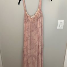 Never Worn Purple Flowy Dress For Casual Occasions, Feminine Mauve Midi Dress, Spring Mauve Maxi Dress With Floral Print, Mauve Sleeveless Dress With Floral Print, Chic Mauve Midi Dress For Spring, Chic Flowy Mauve Dress, Purple Flowy Dress For Date Night, Flowy Purple Dress For Date Night, Purple Sleeveless Midi Dress For Casual Occasions