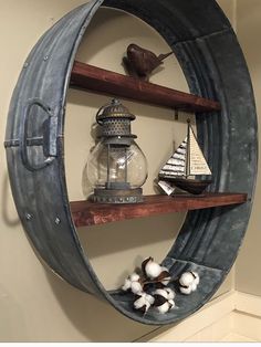 a shelf with some items on it and a lantern in the middle next to it