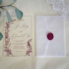 a wedding card and envelope with a wax seal