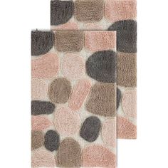 two rugs with different colors and shapes on the side, one in grey, one in pink