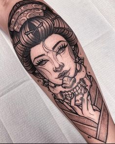 a woman's arm with a tattoo on it and an image of her face