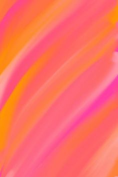 an orange, pink and yellow painting is shown in this artistic photo with the colors being added to it