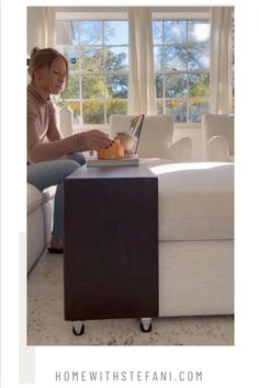 a woman is sitting on the couch with her laptop in front of her and text overlay that reads, how to use a coffee table for small spaces