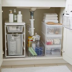 the bathroom is organized and ready to be used as a storage area for toiletries