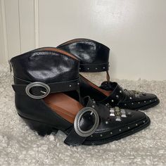 Coach Black Leather Cut Out Western Creeper Bootie Bejewelled Boots 9 Great Pre Loved Condition; Only Worn A Few Times Size 9 Us, 39.5 Eu Leather Upper Leather Lining And Footbed Leather Outsole Zip Closure Shaft: 5 1/2" Height, 9 1/2" Circumference 2" Heel Western Leather Embellished Boots, Western Style Embellished Leather Boots, Western Style Flat Heel Party Boots, Western Style Party Boots With Flat Heel, Embellished Leather Boots With Snip Toe, Embellished Black Heeled Boots For Fall, Black Embellished Heeled Boots For Fall, Designer Embellished Black Boots, Leather Embellished Boots With Round Toe