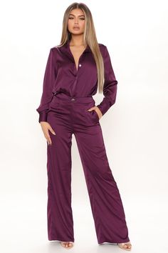 Available In Emerald And Plum. Satin Pant Set Long Sleeve Bodysuit Collar Button Down Snap Button Closure Thong Bottom Wide Leg Pant Elastic Waistband Zipper Inseam 32.5" Final Sale 96% Polyester, 4% Spandex Imported | Office Favorite Satin Pant Set in Plum size Large by Fashion Nova Solid Button-up Pants For Workwear, Chic Button-up Solid Pants, Solid Bottoms With Button Closure For Night Out, Night Out Bottoms With Button Closure, Wide Leg Jumpsuits With Button Closure For Work, Chic Button-up Party Bottoms, Chic Button-up Bottoms For Night Out, Wide Leg Pants With Button Closure For Night Out, Formal Button-up Bottoms