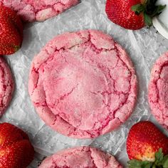 strawberry shortbread cookies with powdered sugar and fresh strawberries on the table top