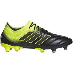 a black and yellow soccer shoe with neon green accents on the upper part of it